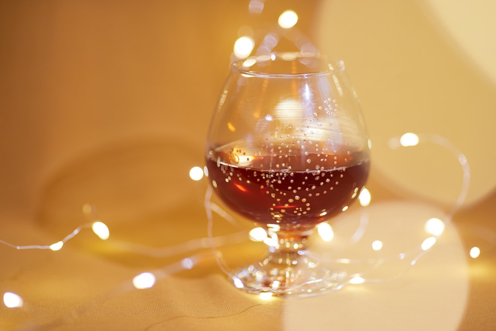 clear wine glass with red wine