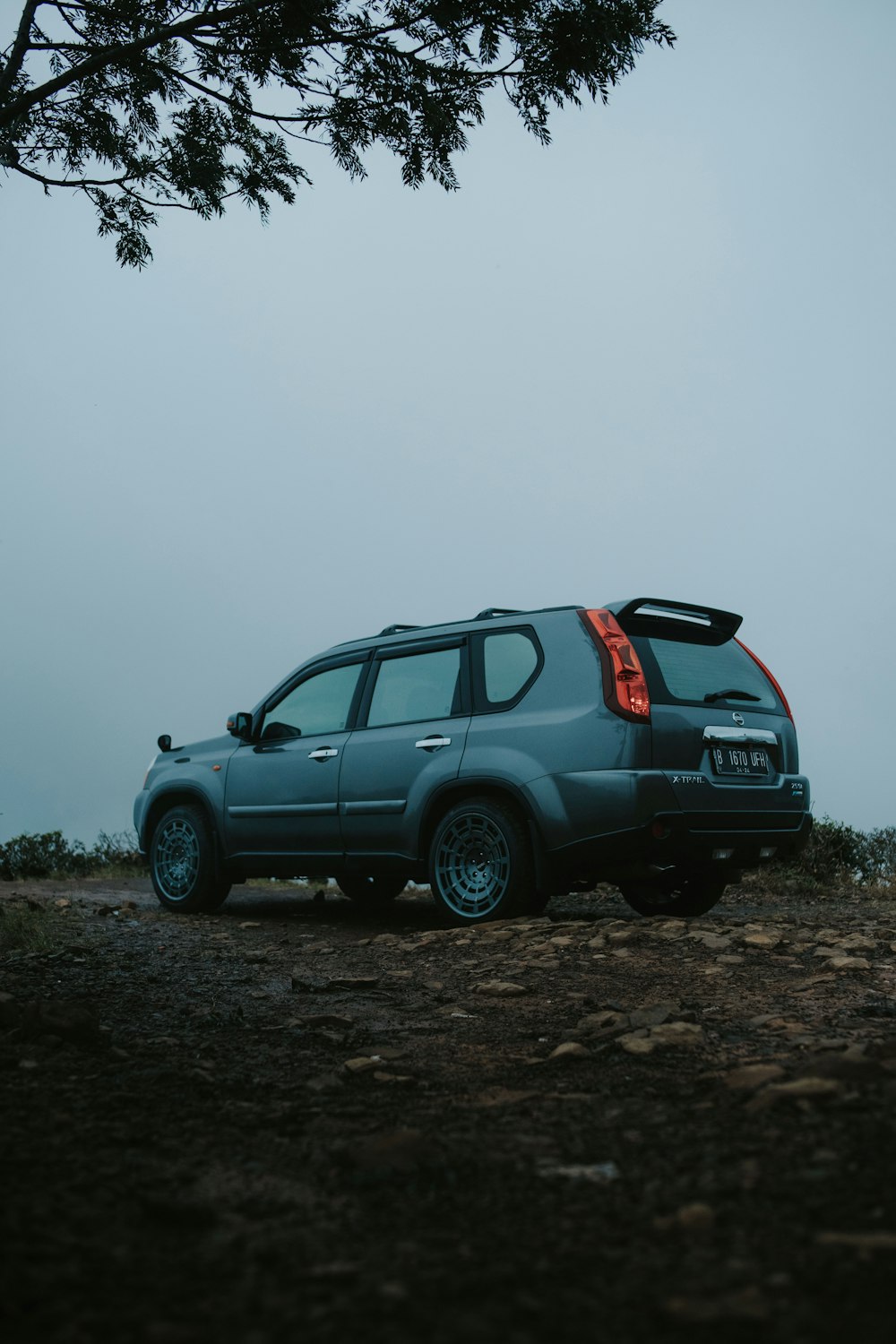 black suv on brown soil