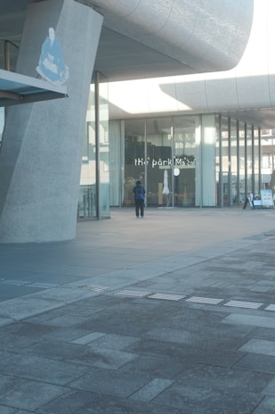 Commercial concrete installation with durable surface and clean lines at a storefront entrance.