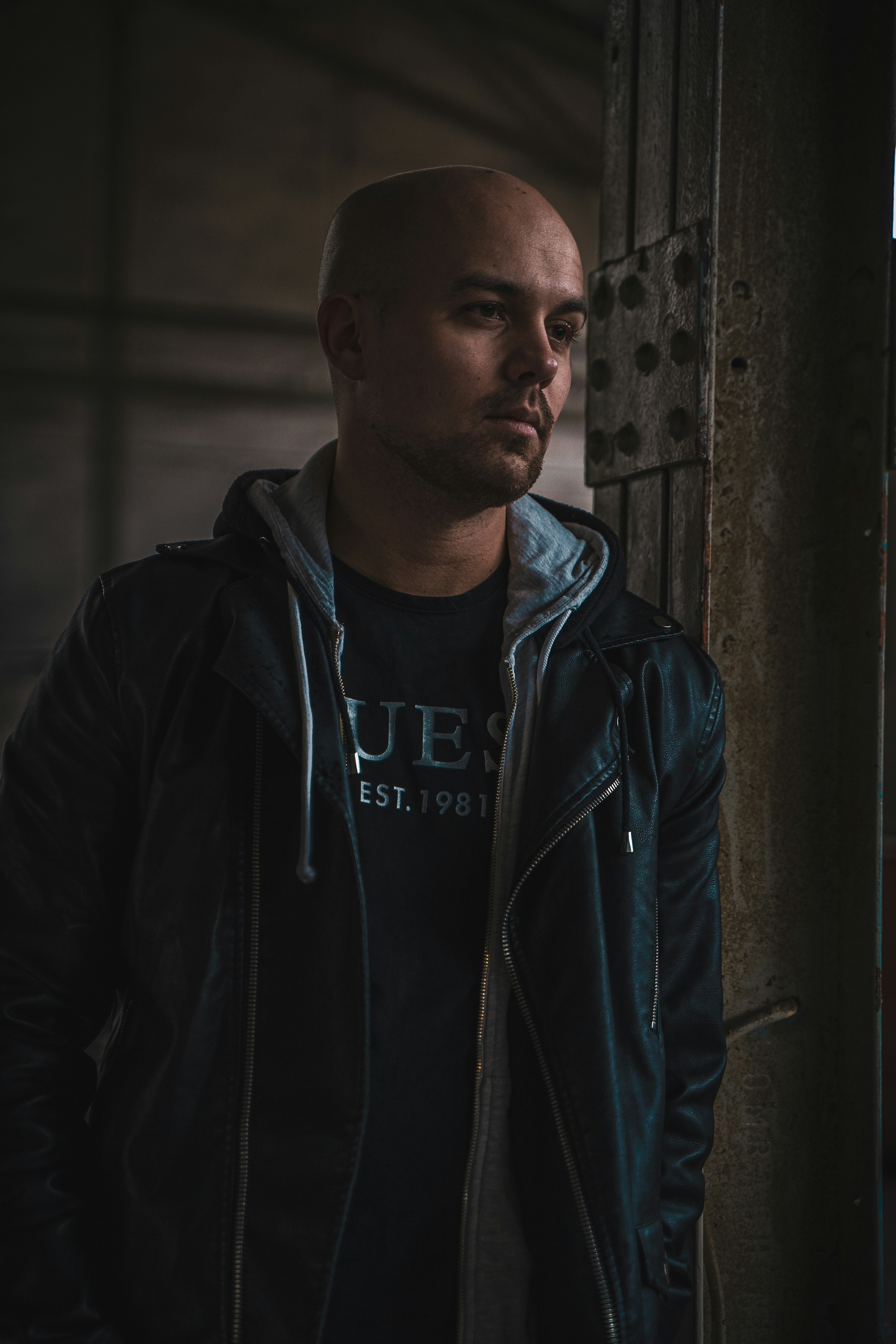 man in black leather jacket