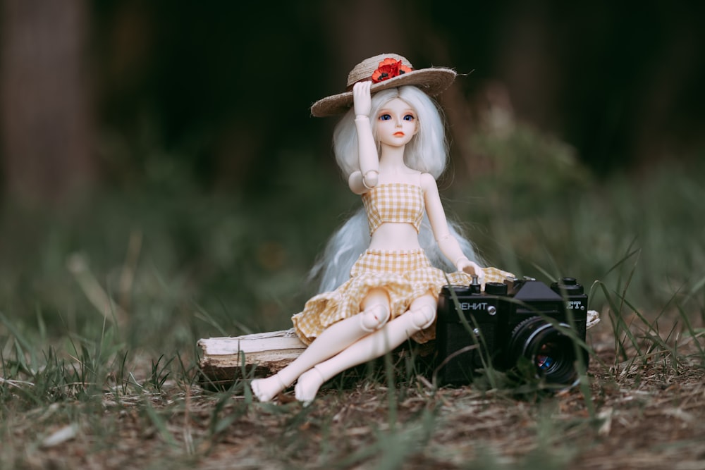 girl in white and brown plaid dress figurine