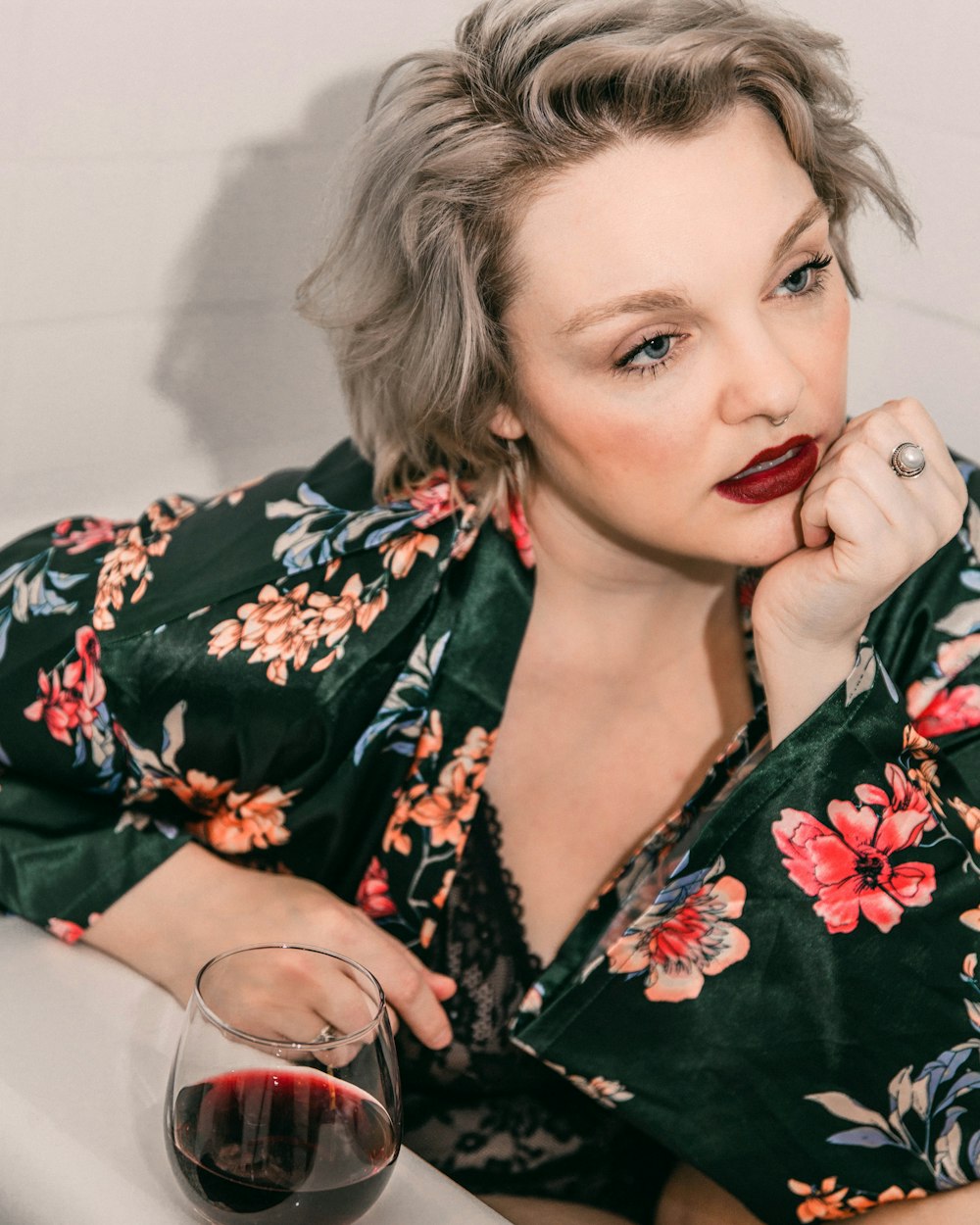 woman in black red and white floral dress