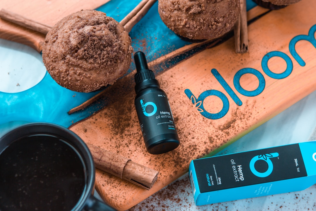 black and green box mod vaporizer beside brown round ornament, Breakfast spread shot for Bloom.