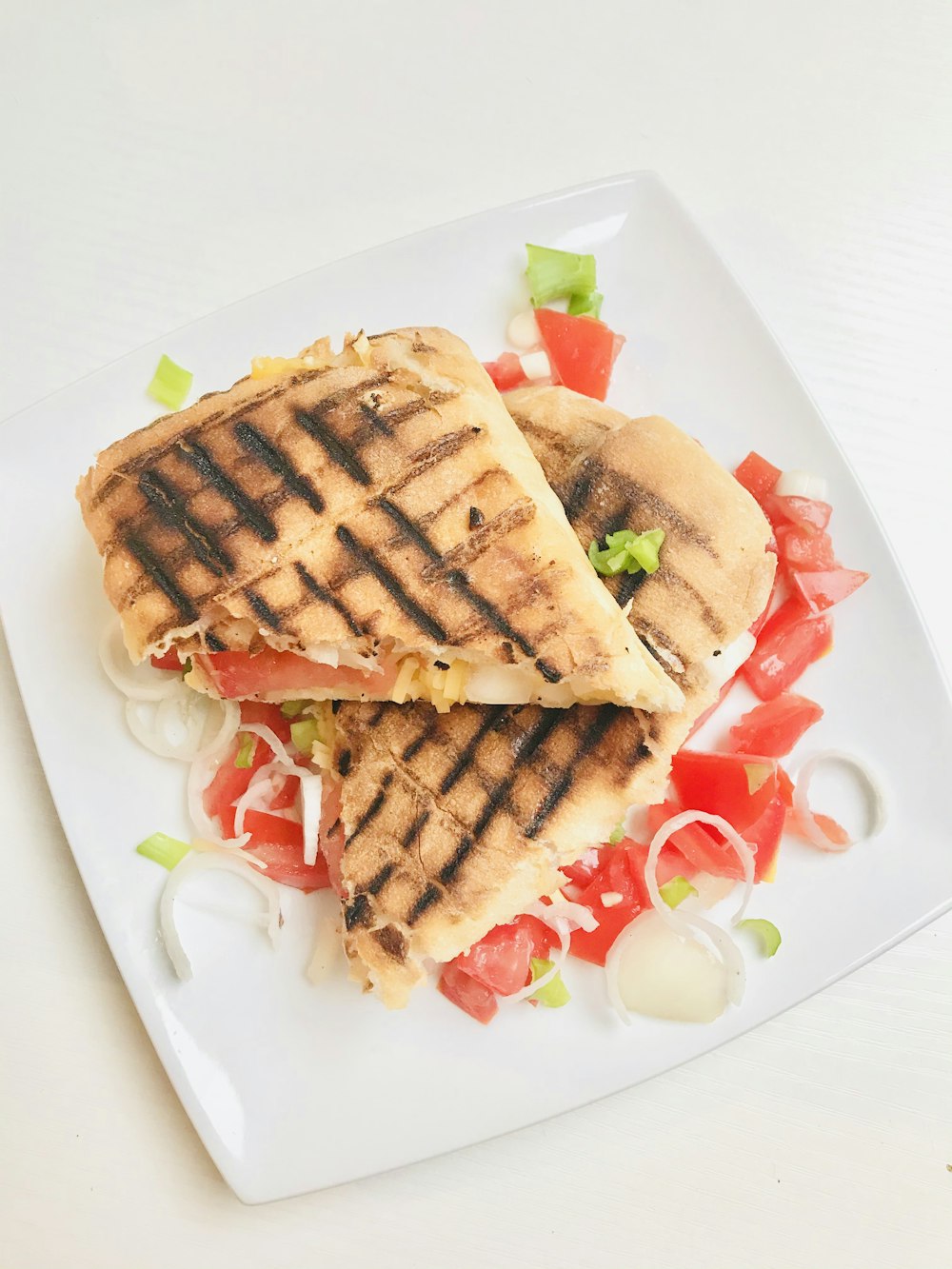 waffle with cream on white ceramic plate