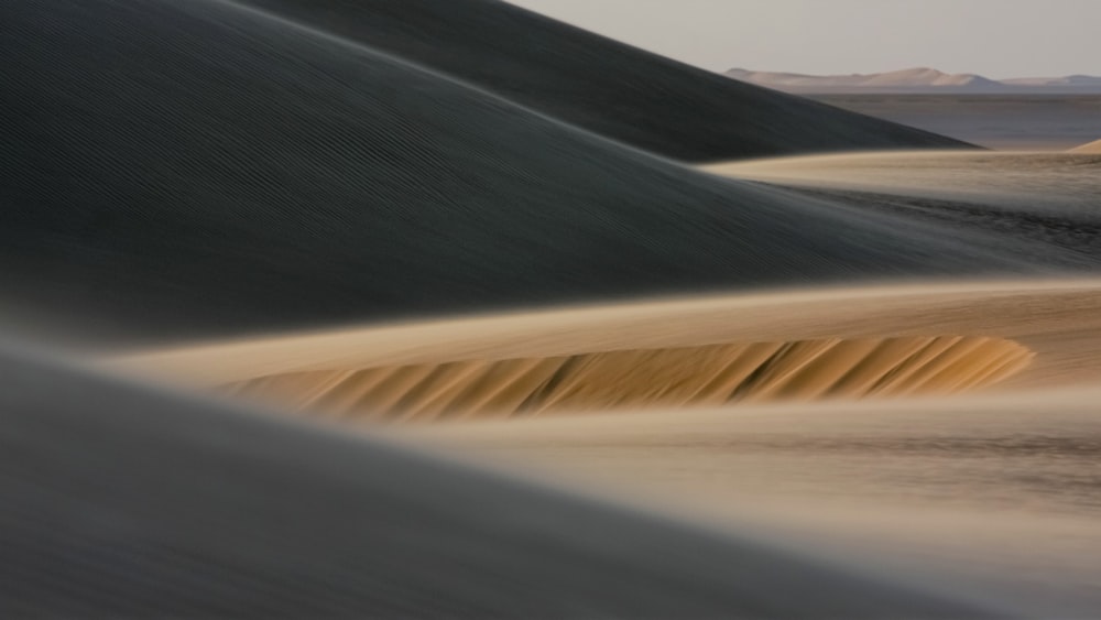 brown sand under sunny sky