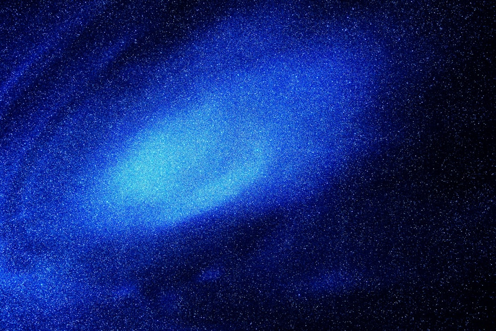 blue and black galaxy illustration