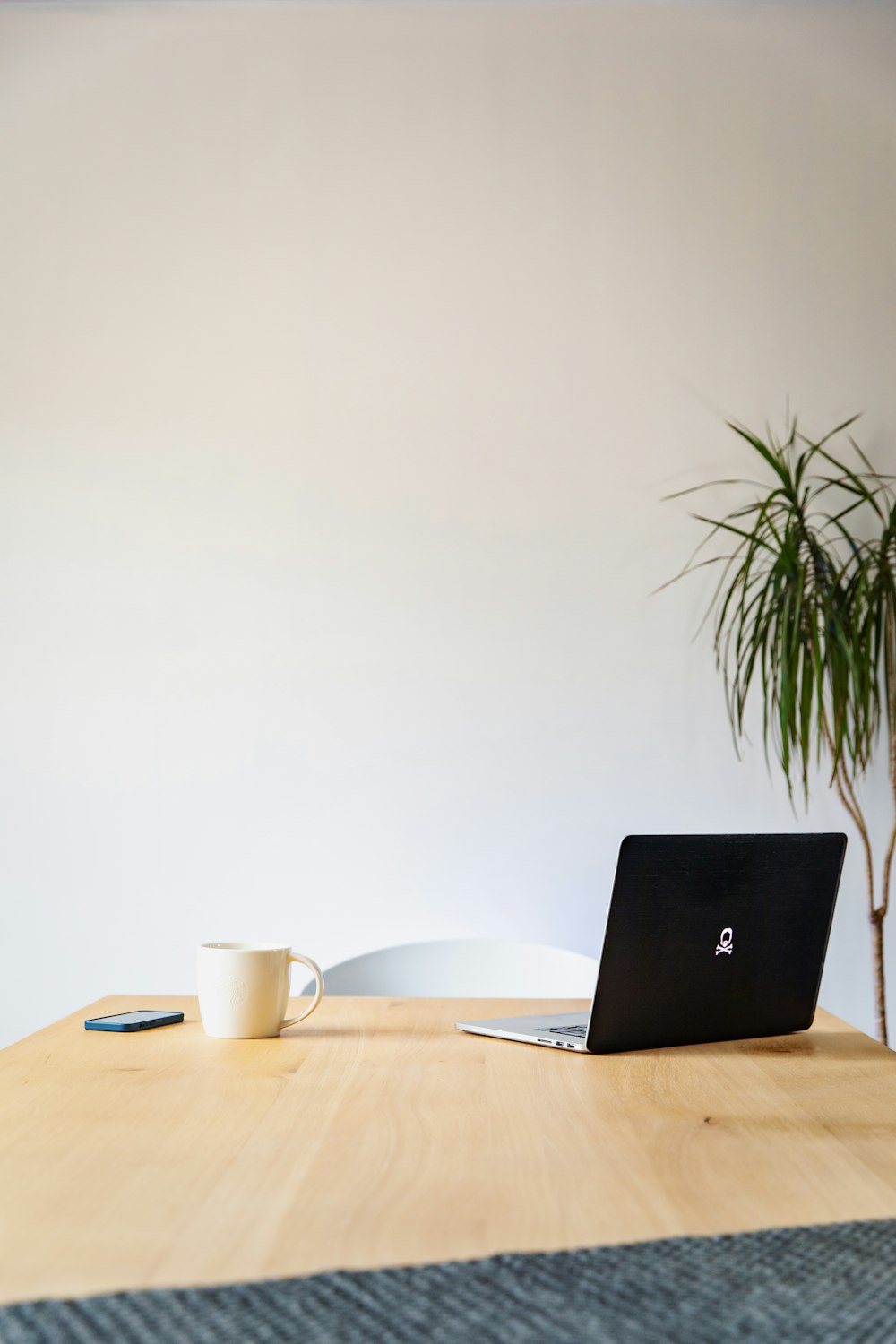 macbook pro on brown wooden table