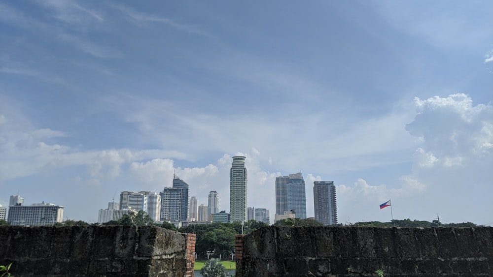 city skyline under blue sky during daytime