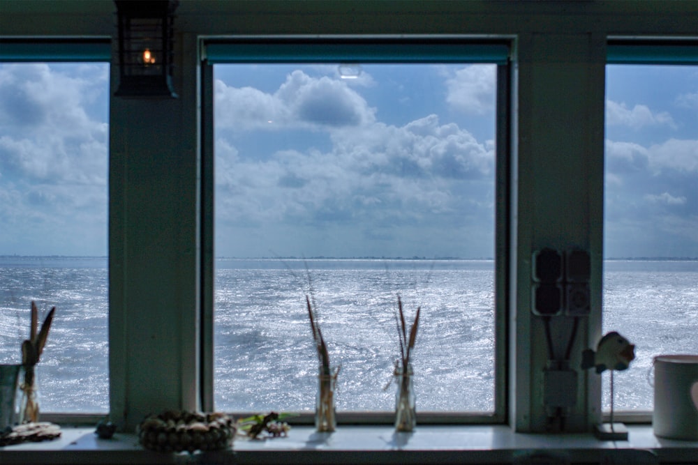 a view of a large body of water in front of a window