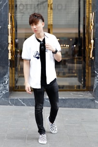 Urban street scene featuring a young adult wearing a Monowear t-shirt, blending modern style with Tokyo city vibes.