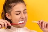 Cleaning teeth with dental appliance