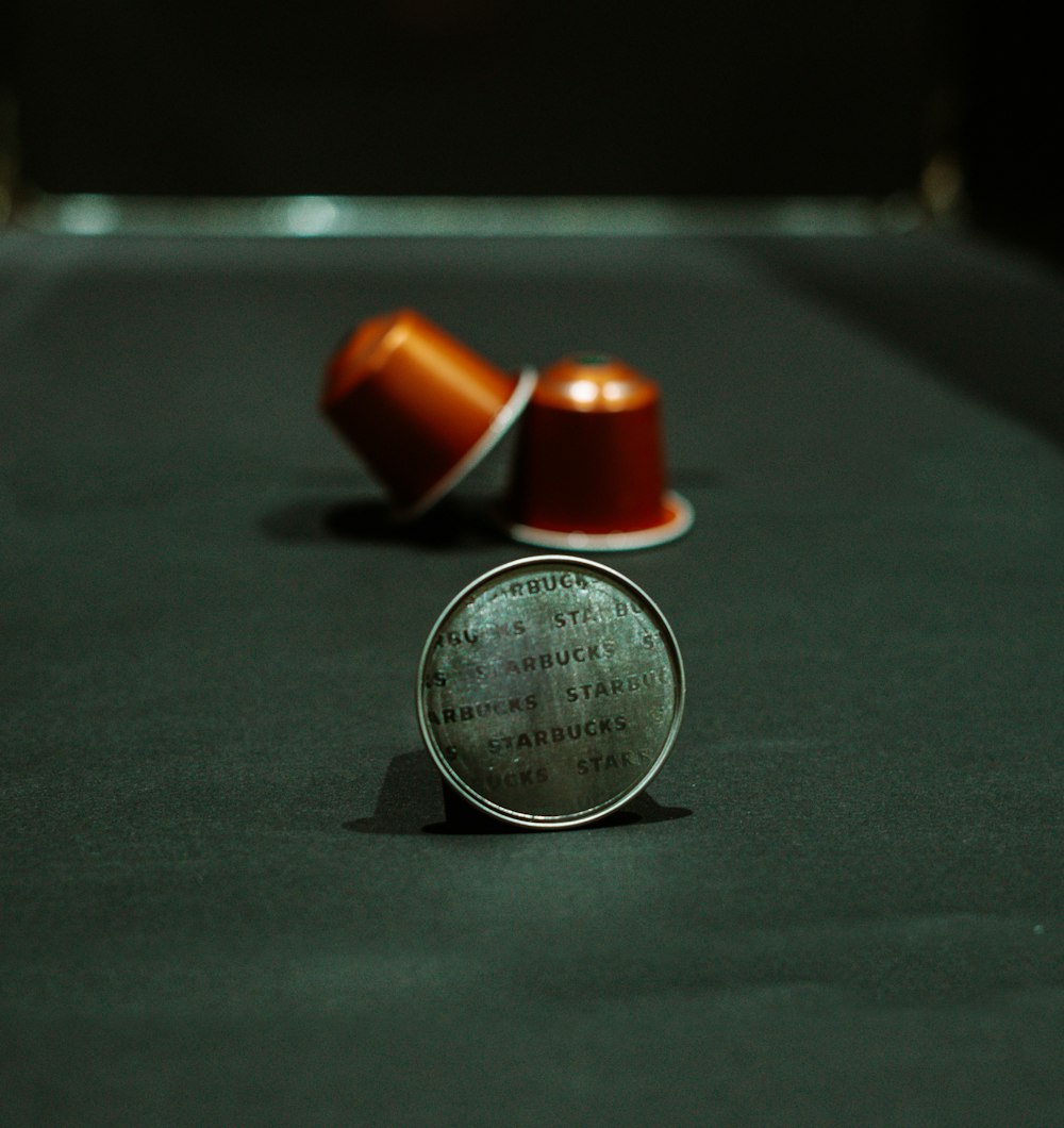 orange and silver round coins