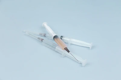 Elegant syringe filled with bio-stimulator solution ready for clinical use.