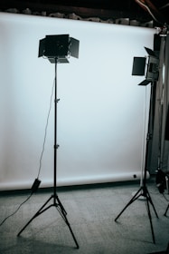 black and gray tripod stand