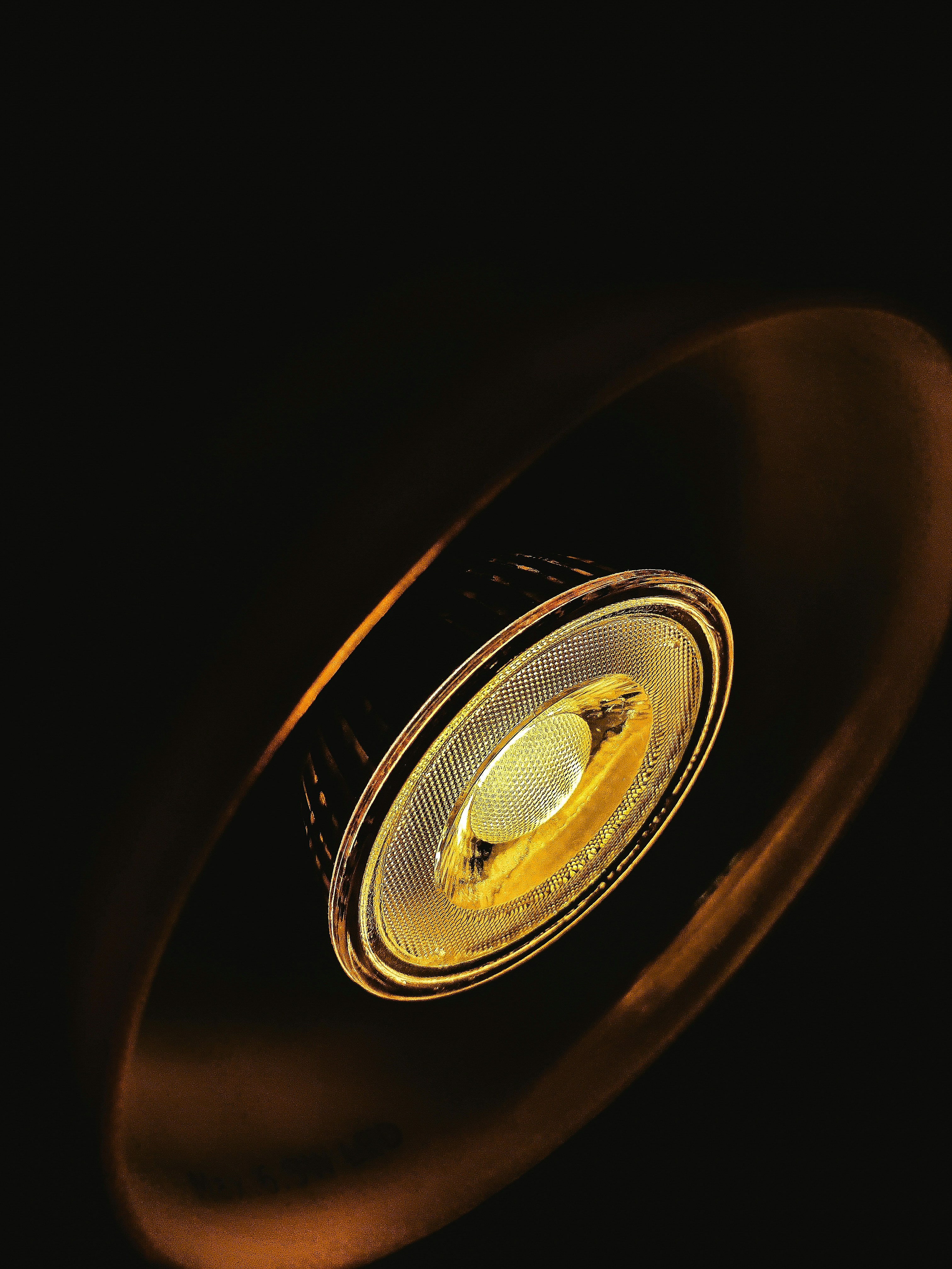 gold and silver round ornament