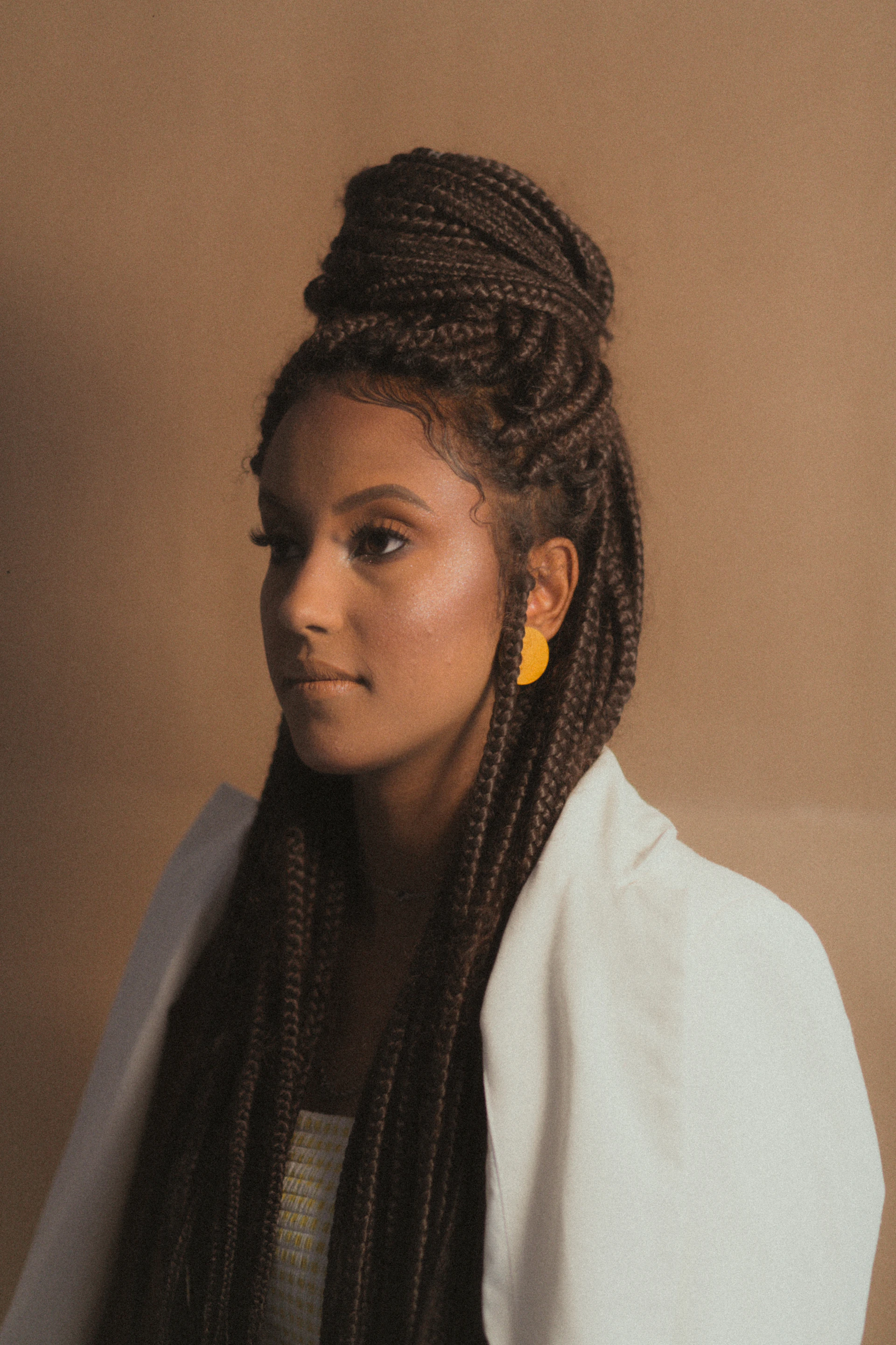 black and brown leather padded tub sofa