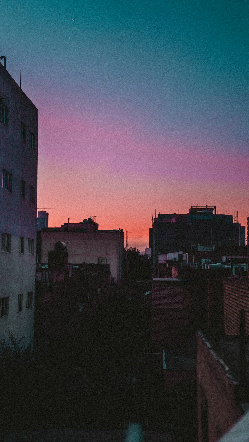 white concrete building during sunset