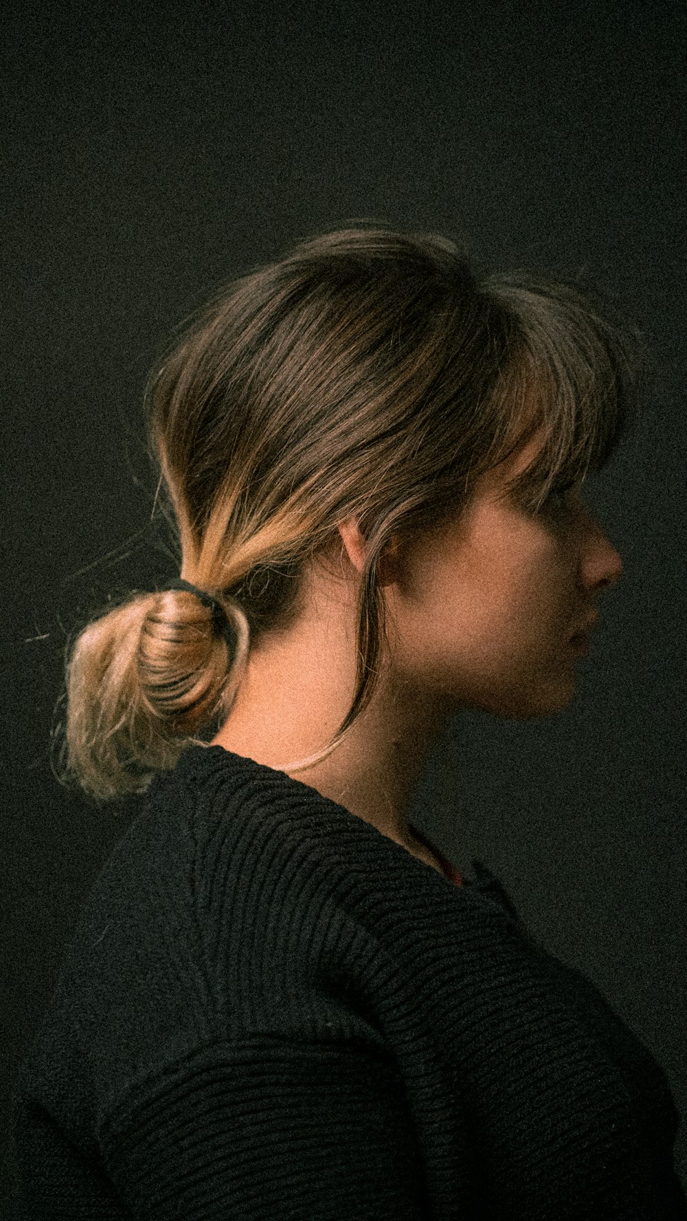 woman in black knit shirt