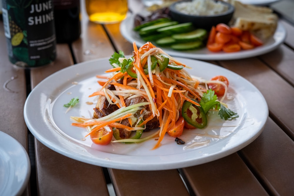 vegetable salad on white ceramic plate