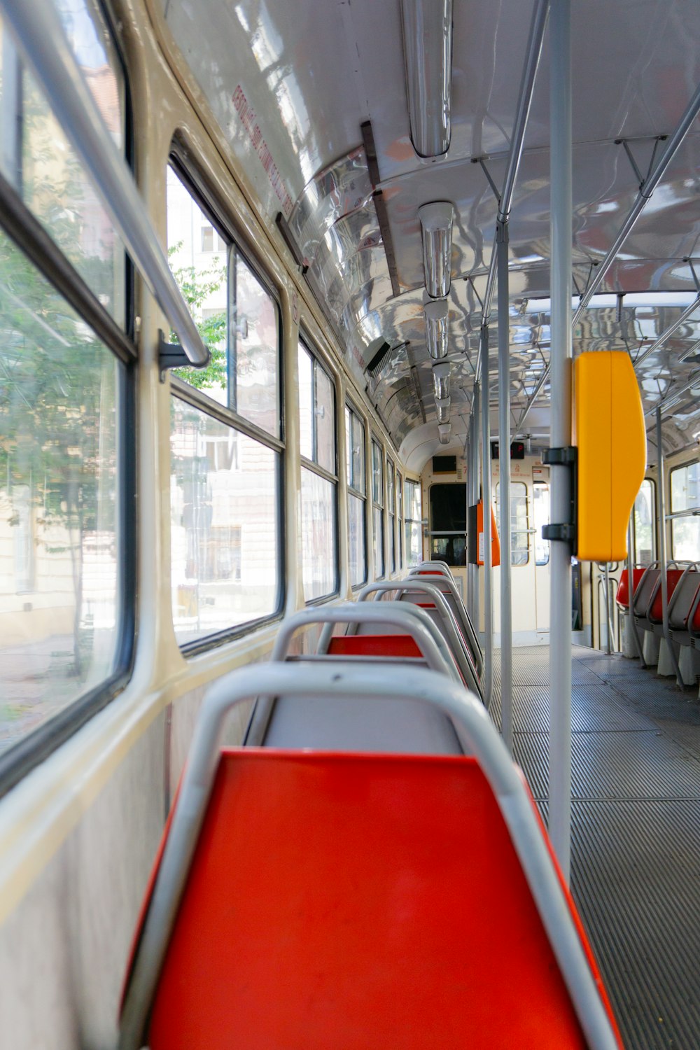 red and yellow train seats