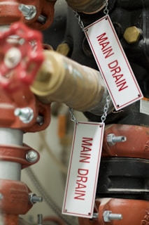 a close up of a red and white fire hydrant