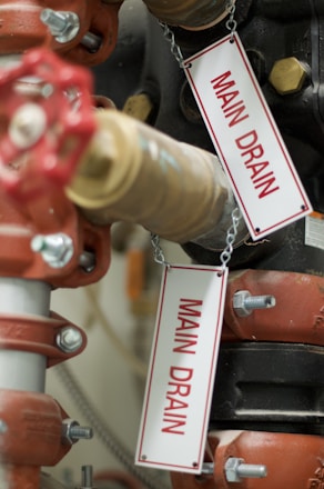 a close up of a red and white fire hydrant