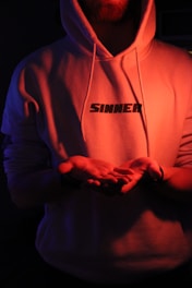 man in gray pullover hoodie