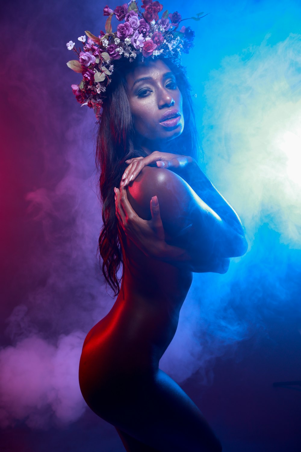 woman in red dress with blue and white flower crown