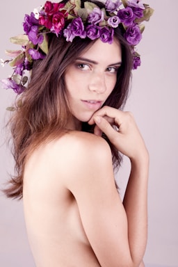 portrait photography,how to photograph topless woman with purple flower on her head