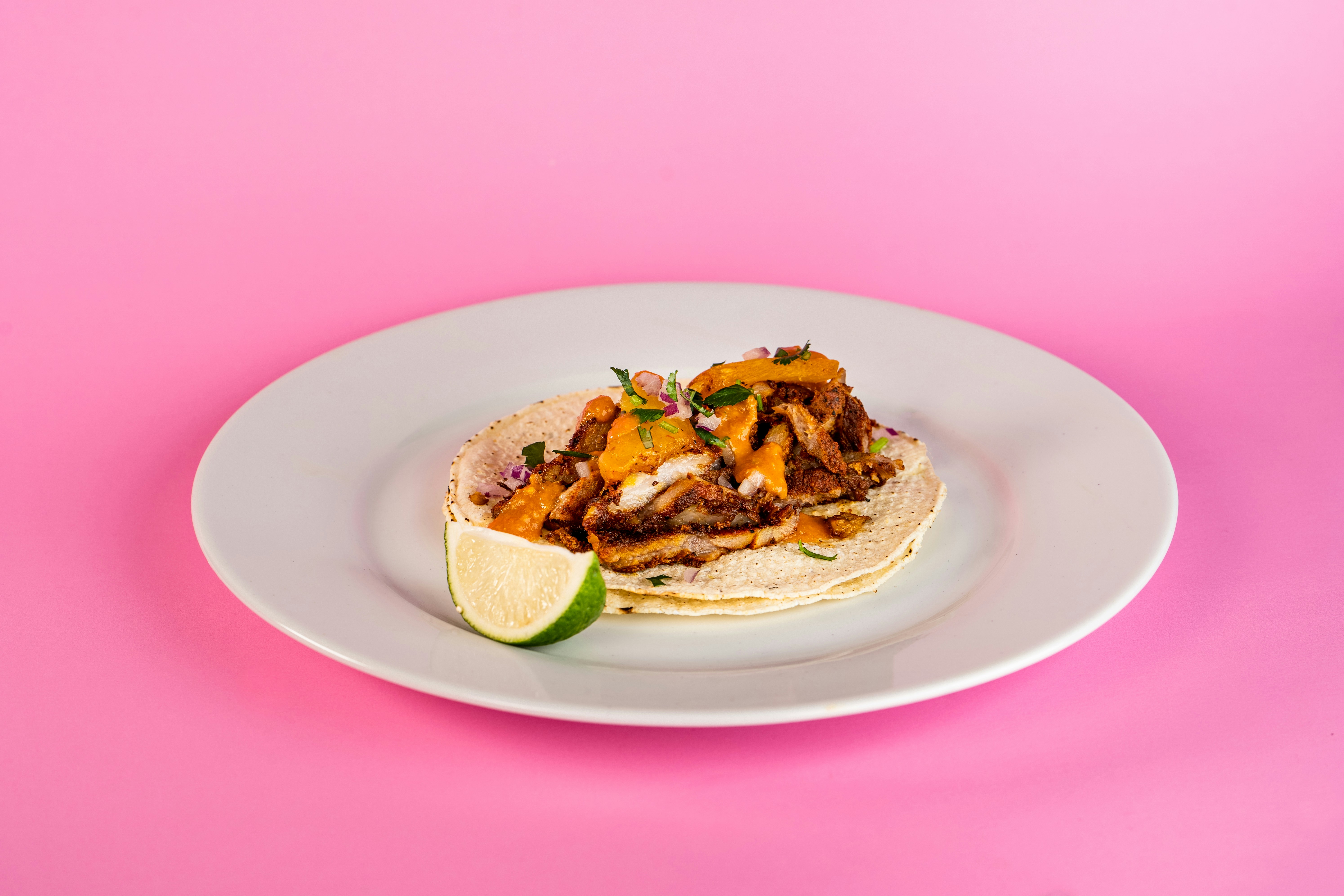 brown bread with brown sauce on white ceramic plate