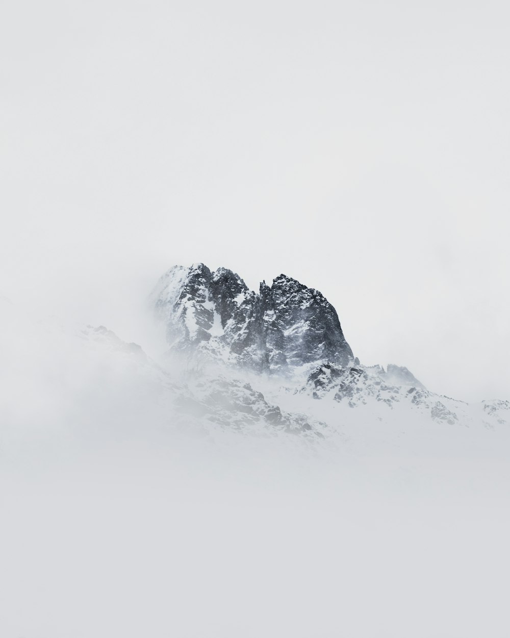 snow covered mountain during daytime