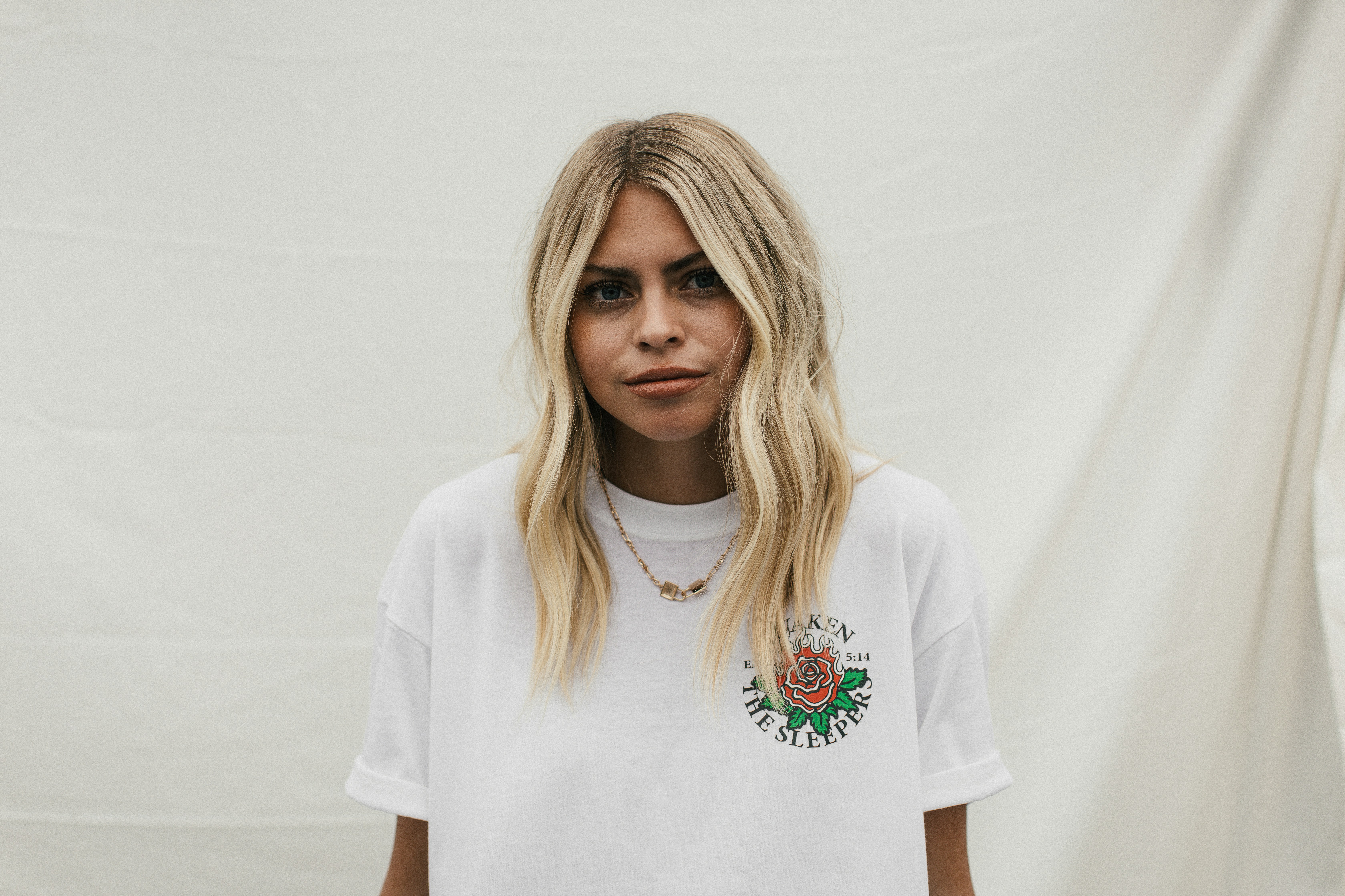 woman in white crew neck t-shirt