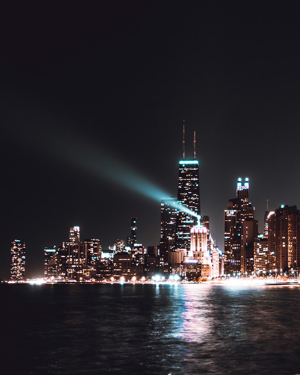 city skyline during night time