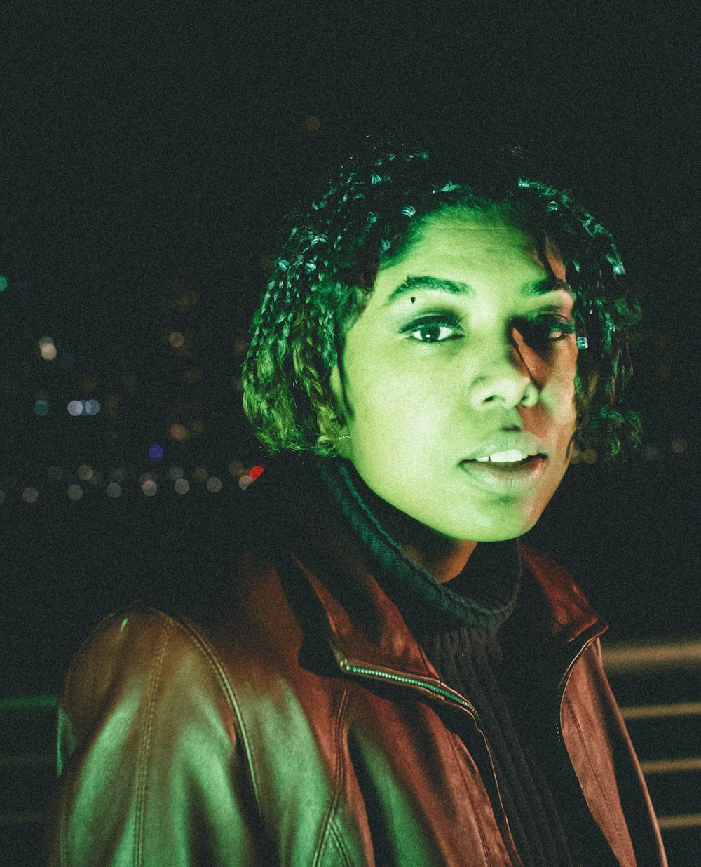 woman in brown leather jacket