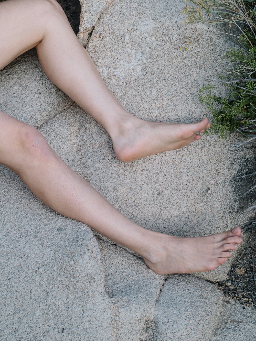 person standing on gray concrete floor