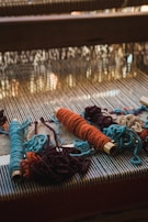 blue and red rope on blue and white textile