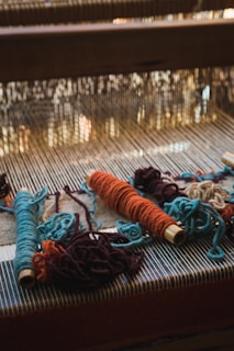 blue and red rope on blue and white textile