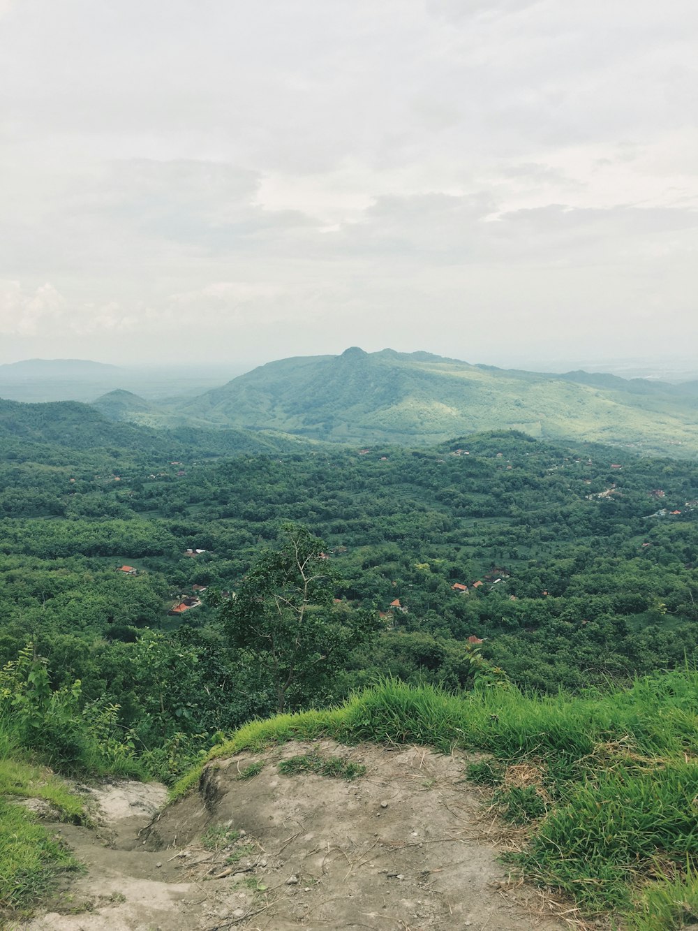 green mountains under white sky during daytime