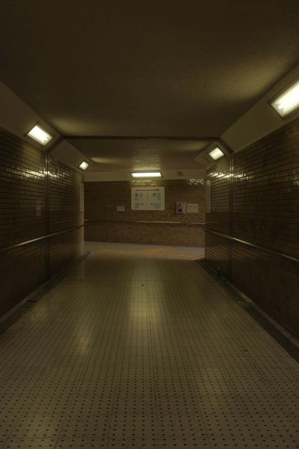 brown and white hallway with no people