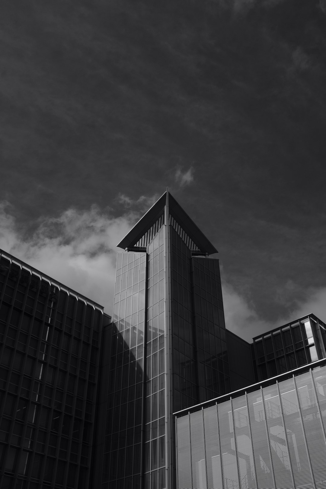 grayscale photo of high rise building