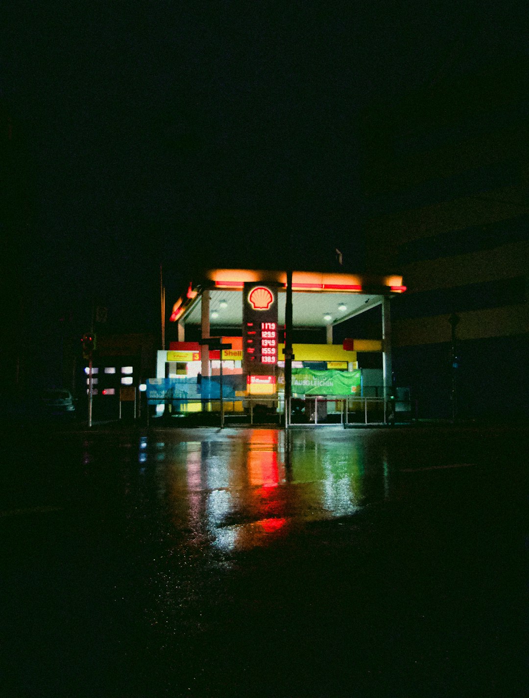 white and red building during night time