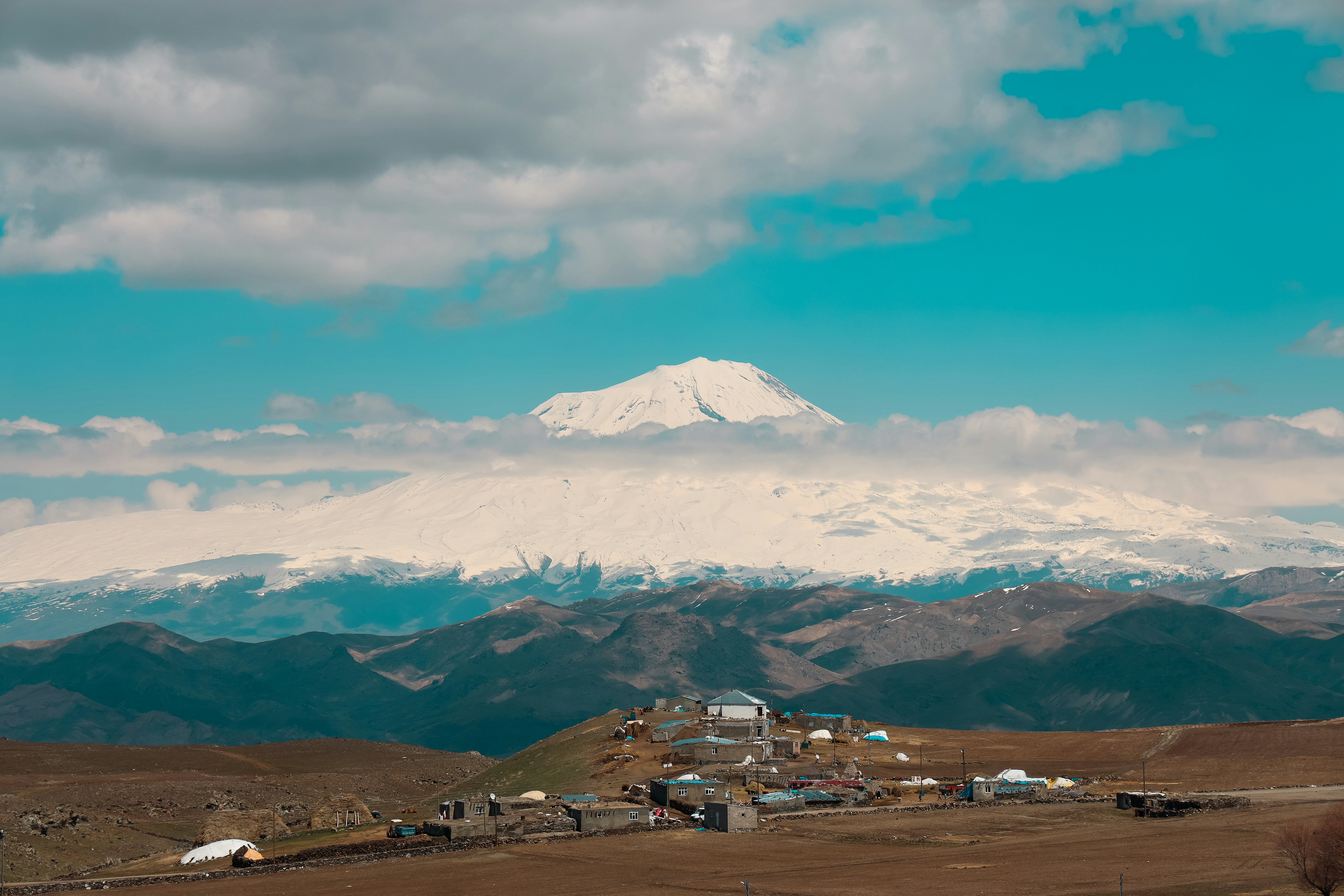 white and brown mountain under blue sky during daytime