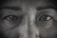 Close-up of a 3D character’s face showing fine details in skin texture and expressive eyes