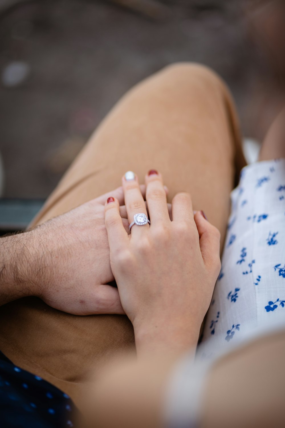 person wearing silver diamond ring