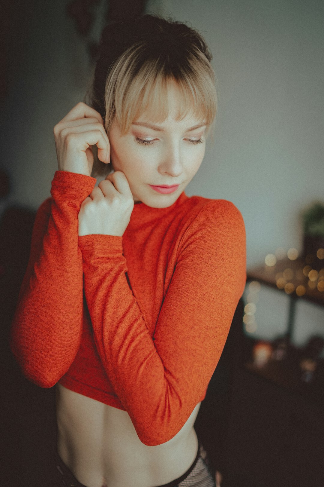 woman in red long sleeve shirt