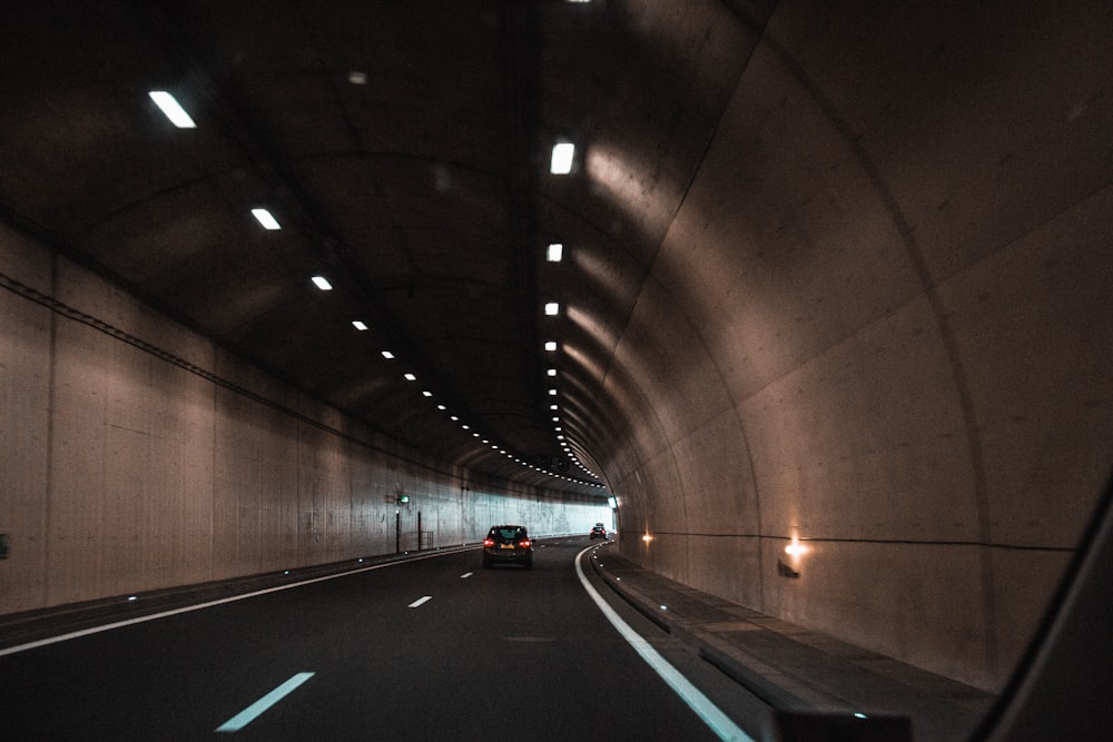 black car on road during daytime