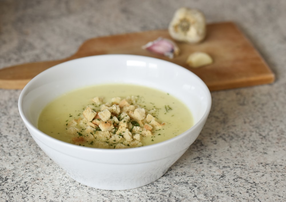 white ceramic bowl with soup