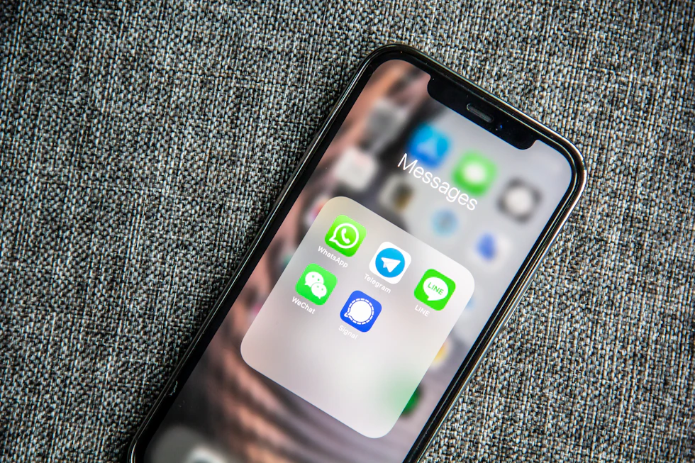 Smartphone with WhatsApp business messaging apps