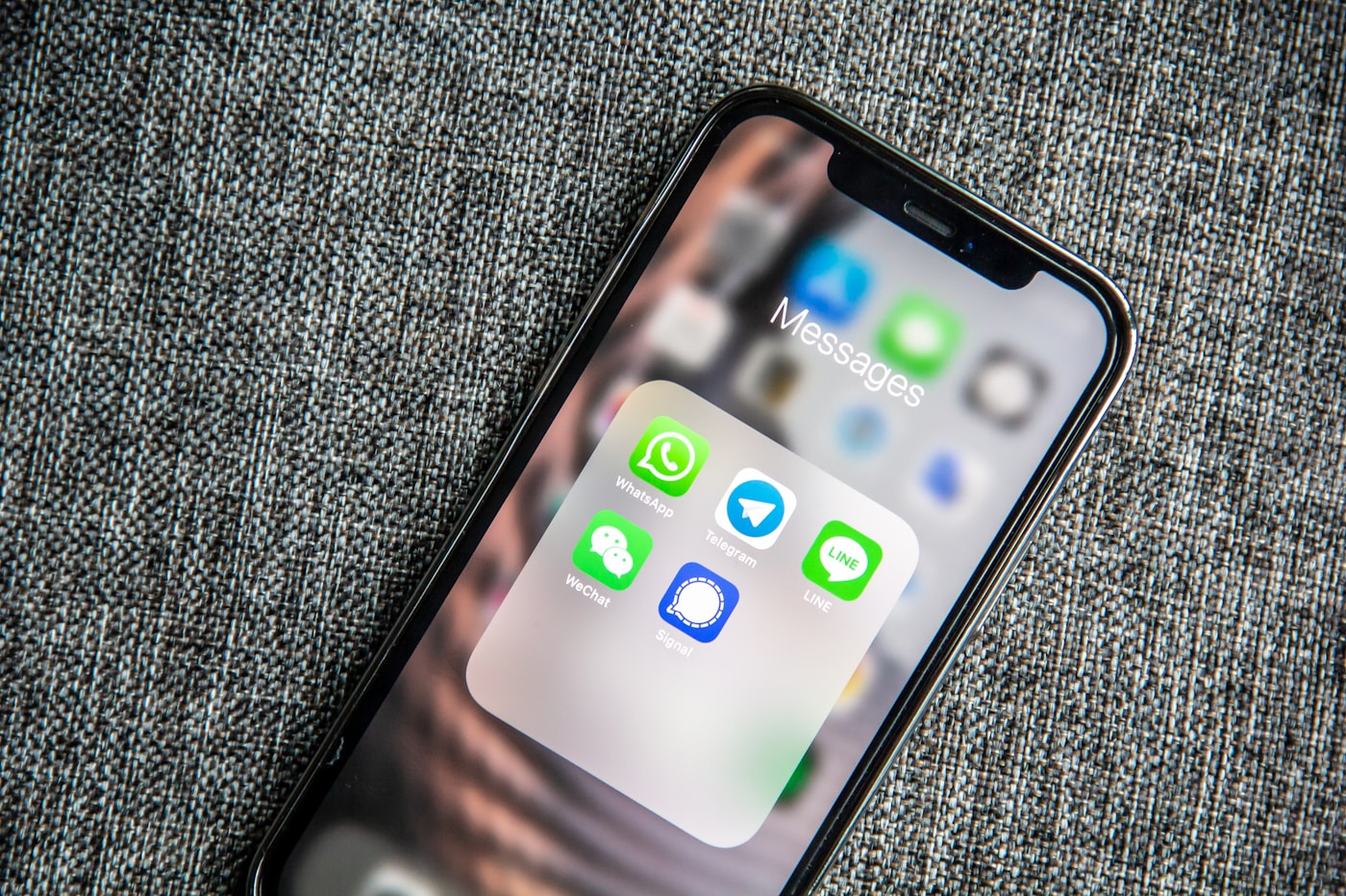 WhatsApp on smartphone for hotel booking