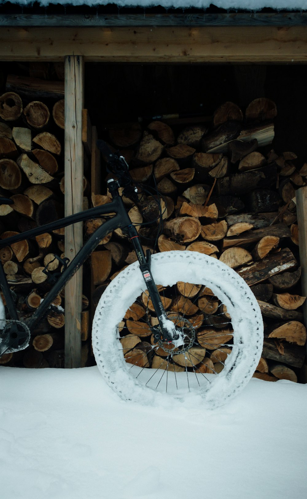 black bicycle wheel on white round textile